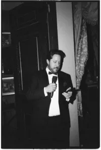 Cinematic wedding photography of groom speech with direct flash at Brunswick house wedding