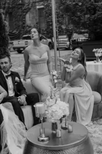 Editorial wedding party blowing kisses