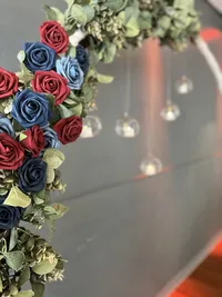 Timeless wedding circle arch adorned with roses and glass orbs - A captivating backdrop for traditions at The District, Clearwater, Florida