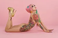 AsianWomanTattoosPinkHair
