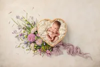 Infant posed for Newborn Photoshoot in Charleston, SC.