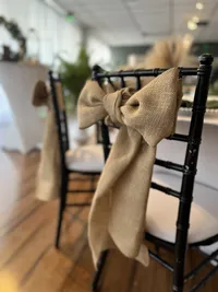 Classic rustic wedding reception Chivari chair with burlap chair sash - Adding rustic charm to your Clearwater event