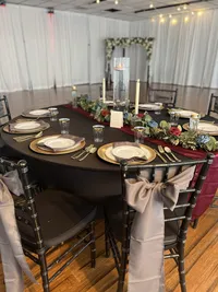 Moody wedding reception guest table with inclusive decor package at Clearwater, Florida event venue - Dark and dramatic ambiance for a memorable celebration