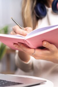 woman-writing-in-book