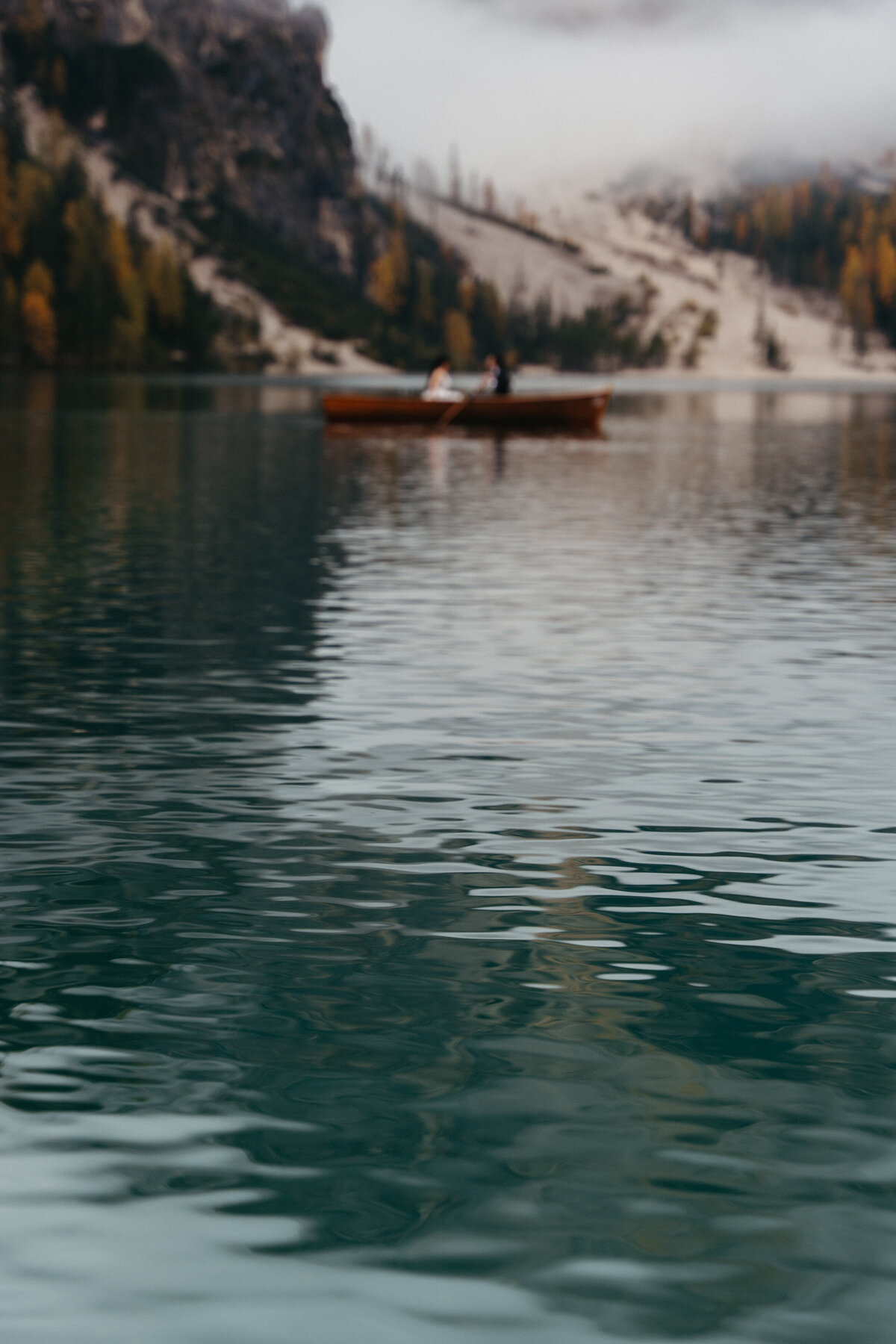 Misty mountains reflected in Lago di Braies