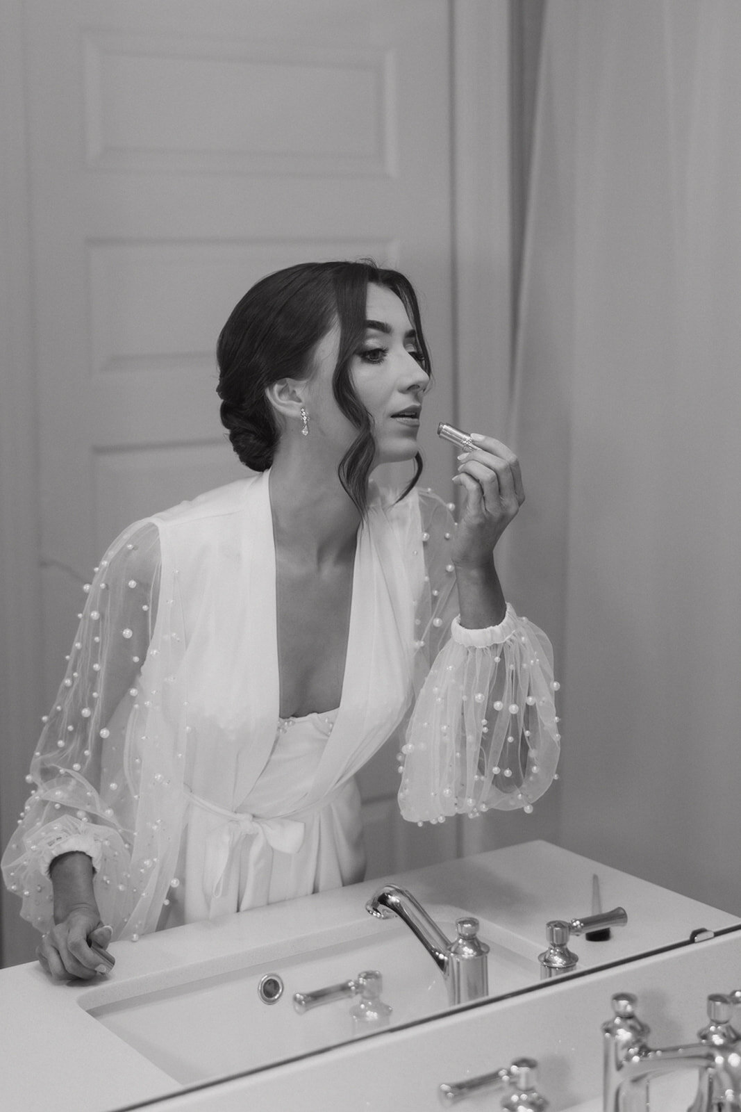bride getting ready at bella collina wedding venue​