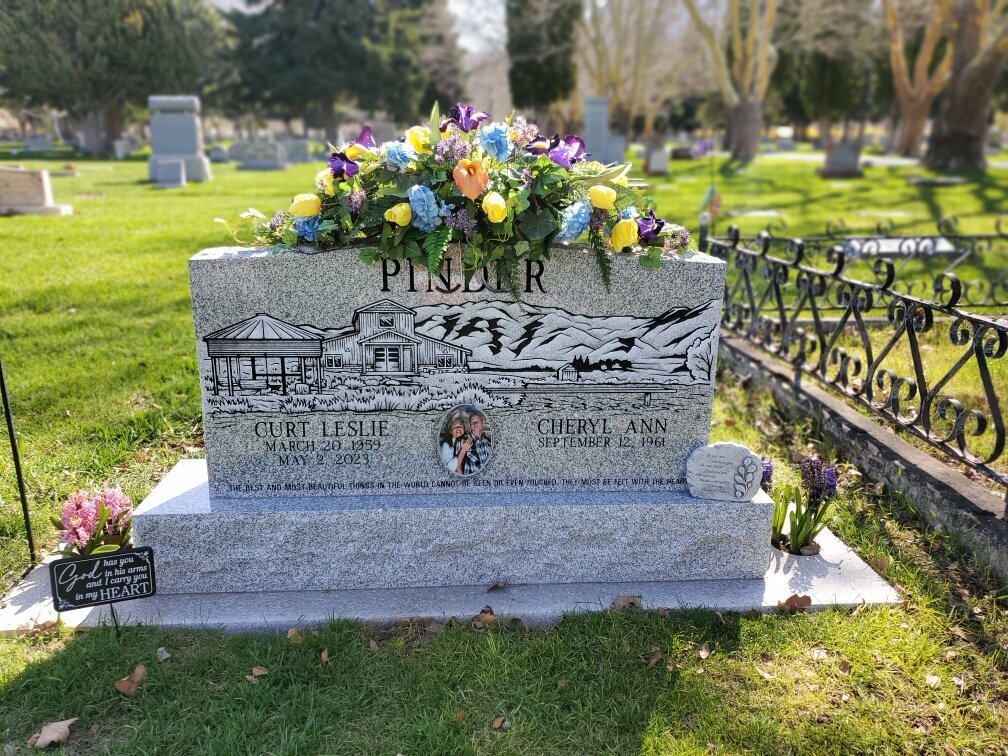 silk arrangement for the top of a headstone for the spring season