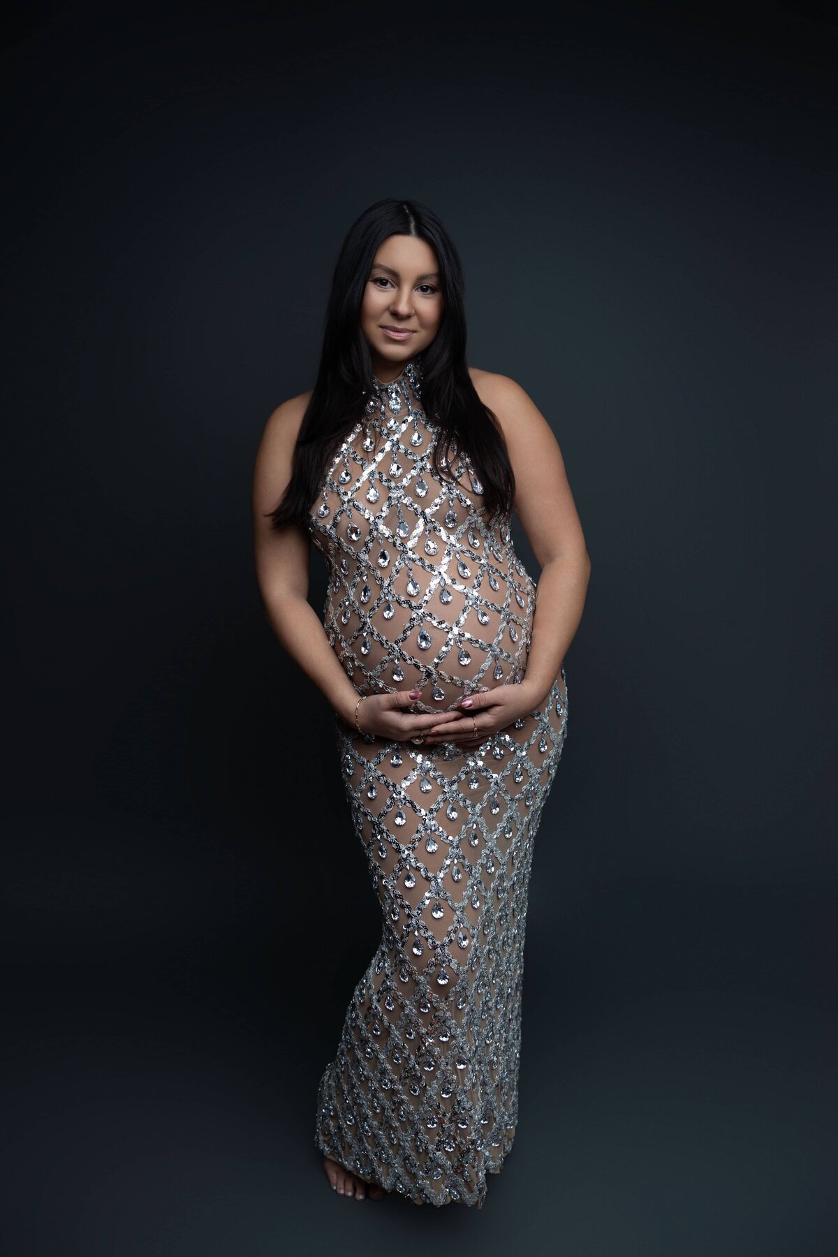 pregnant mom posing in studio
