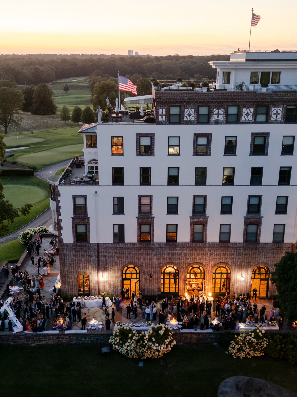 aerial view of outdoor wedding at  Westchester Country Club at sunset