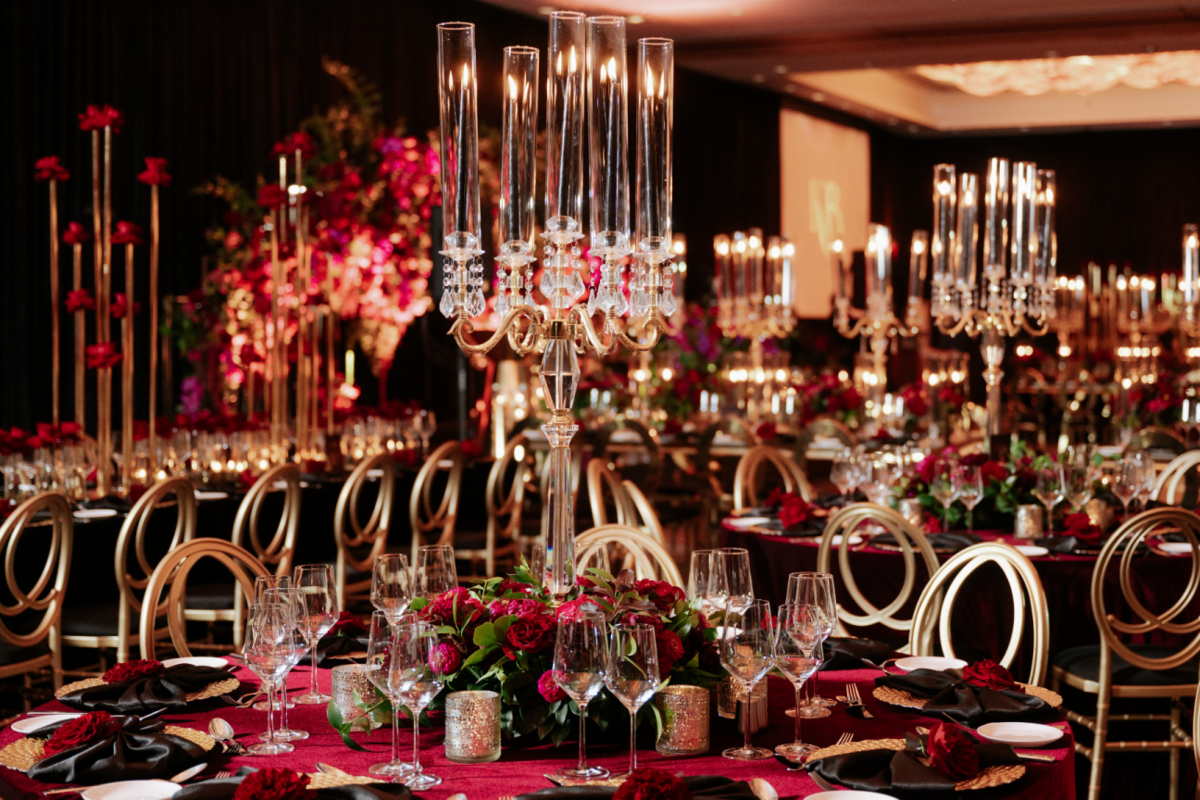 black-gold-pink-burgundy-wedding-reception-crystal-candelabra-red-roses-flowers
