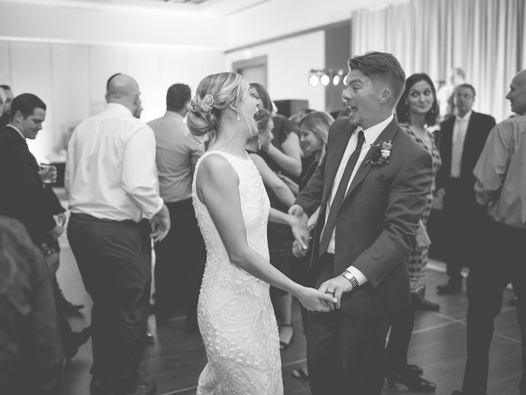 Bride and groom dancing at wedding