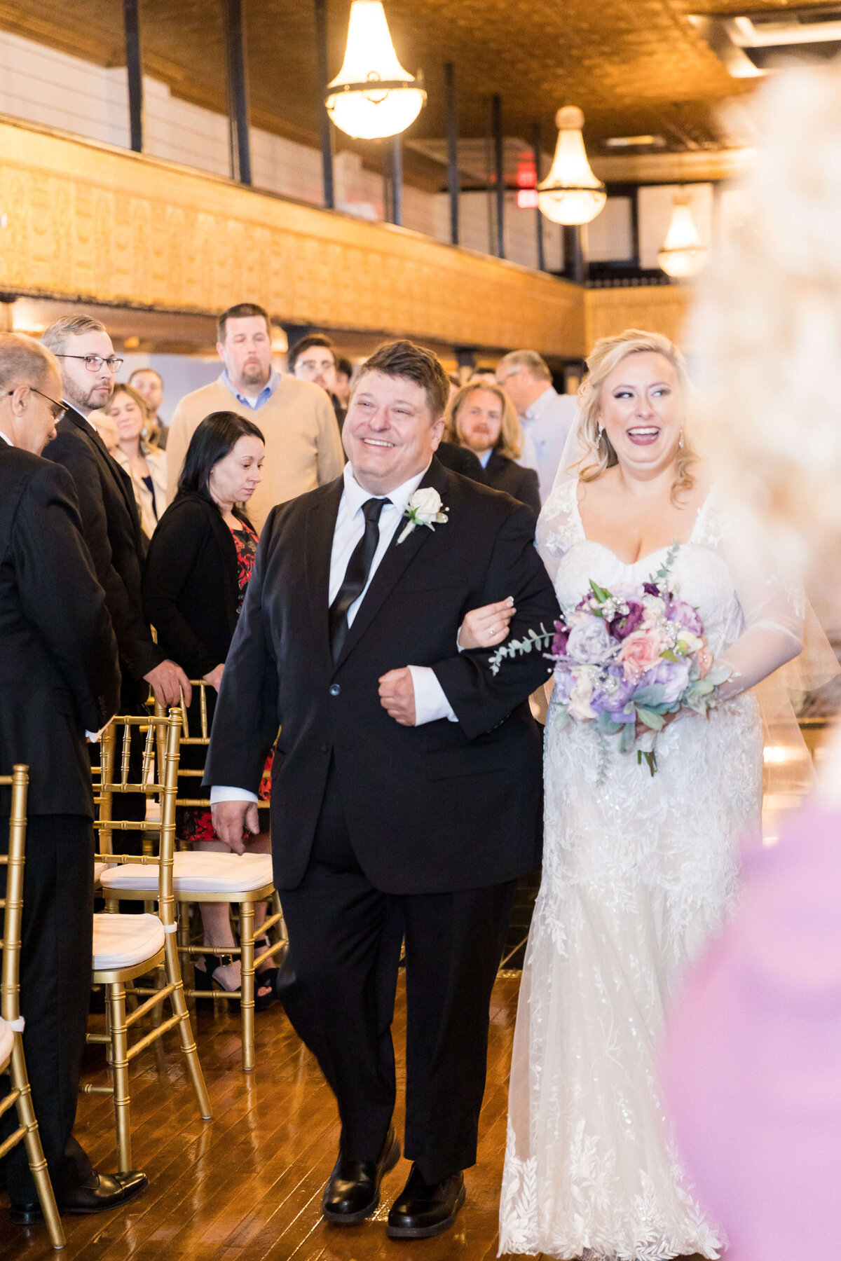 Bride and groom walking down the aisle at  The Gatsby in Shelbyville,KY