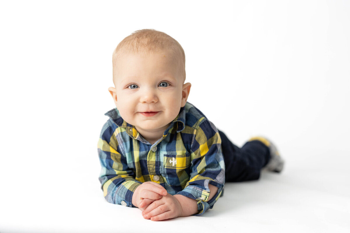 Infant school photo - little boy in plaid shirt