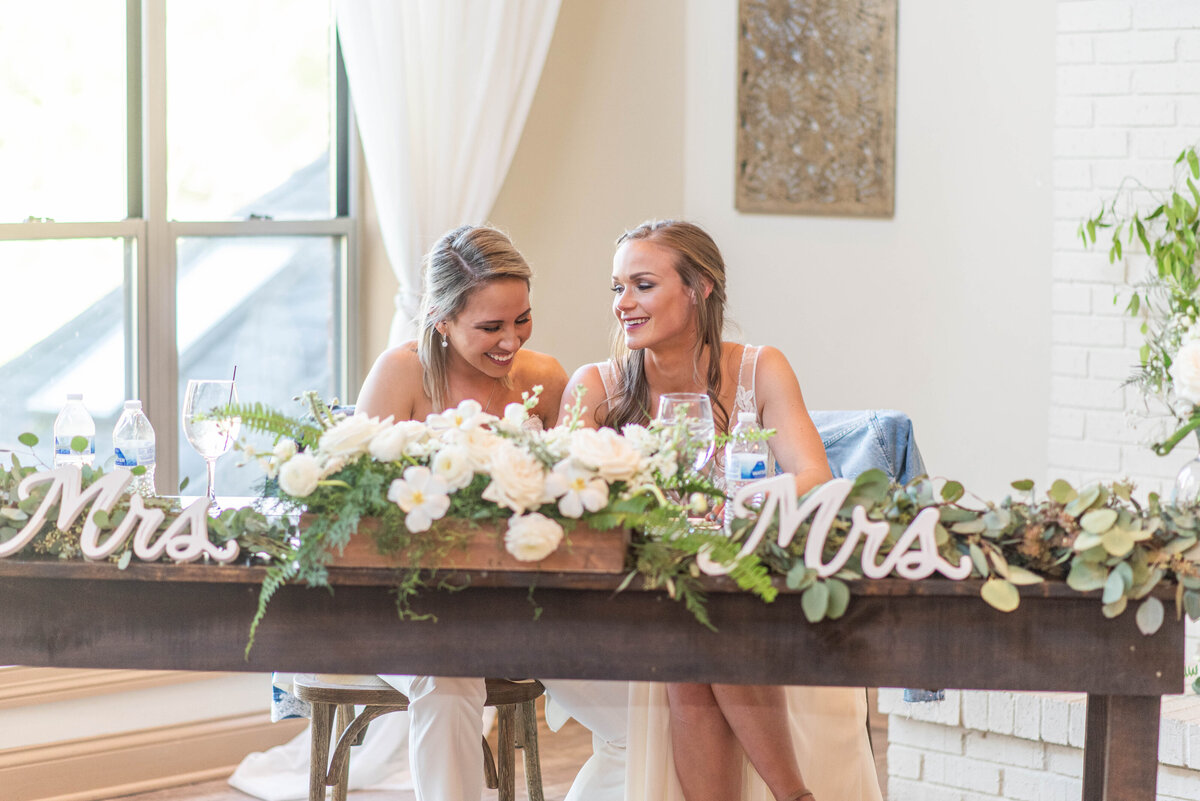 Brides at their sweetheart table