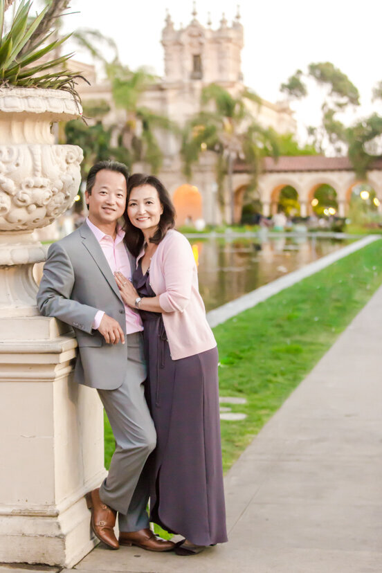 man and wife by reflecing pond balboa park san diego