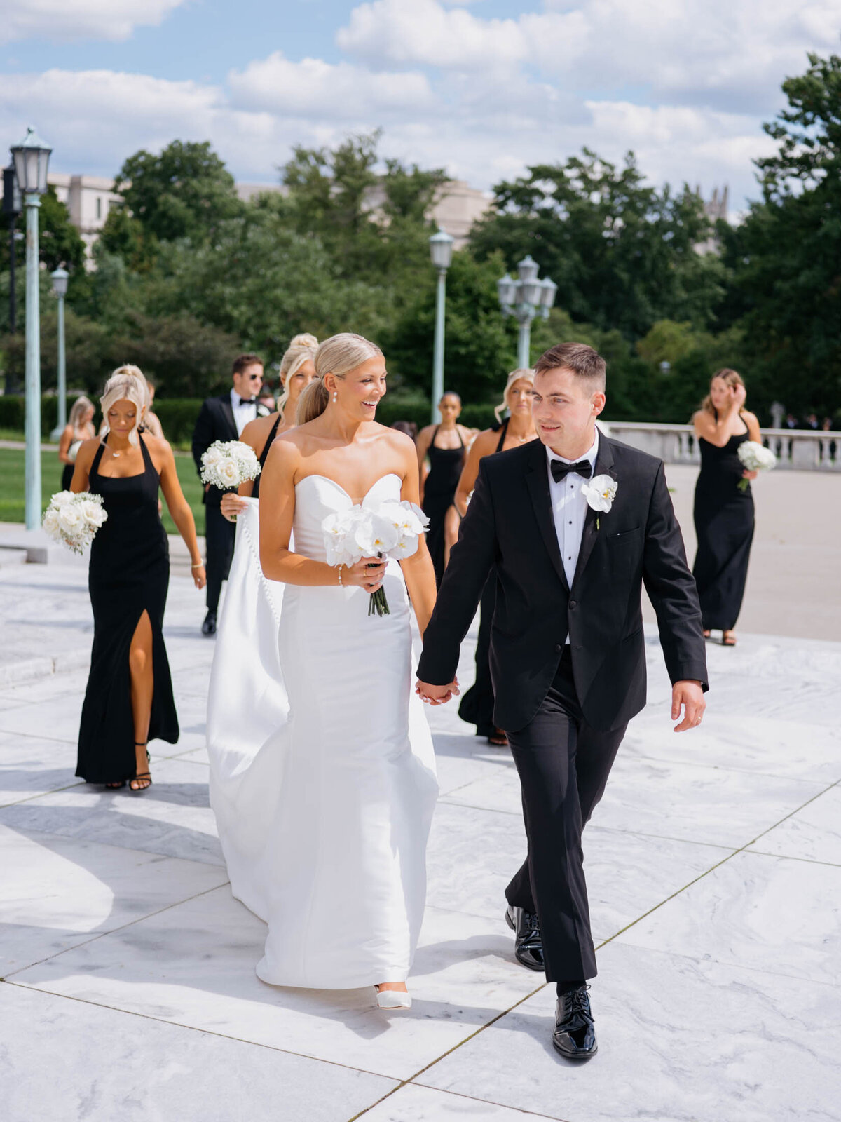 Bride and groom walking at Cleveland Art Museum
