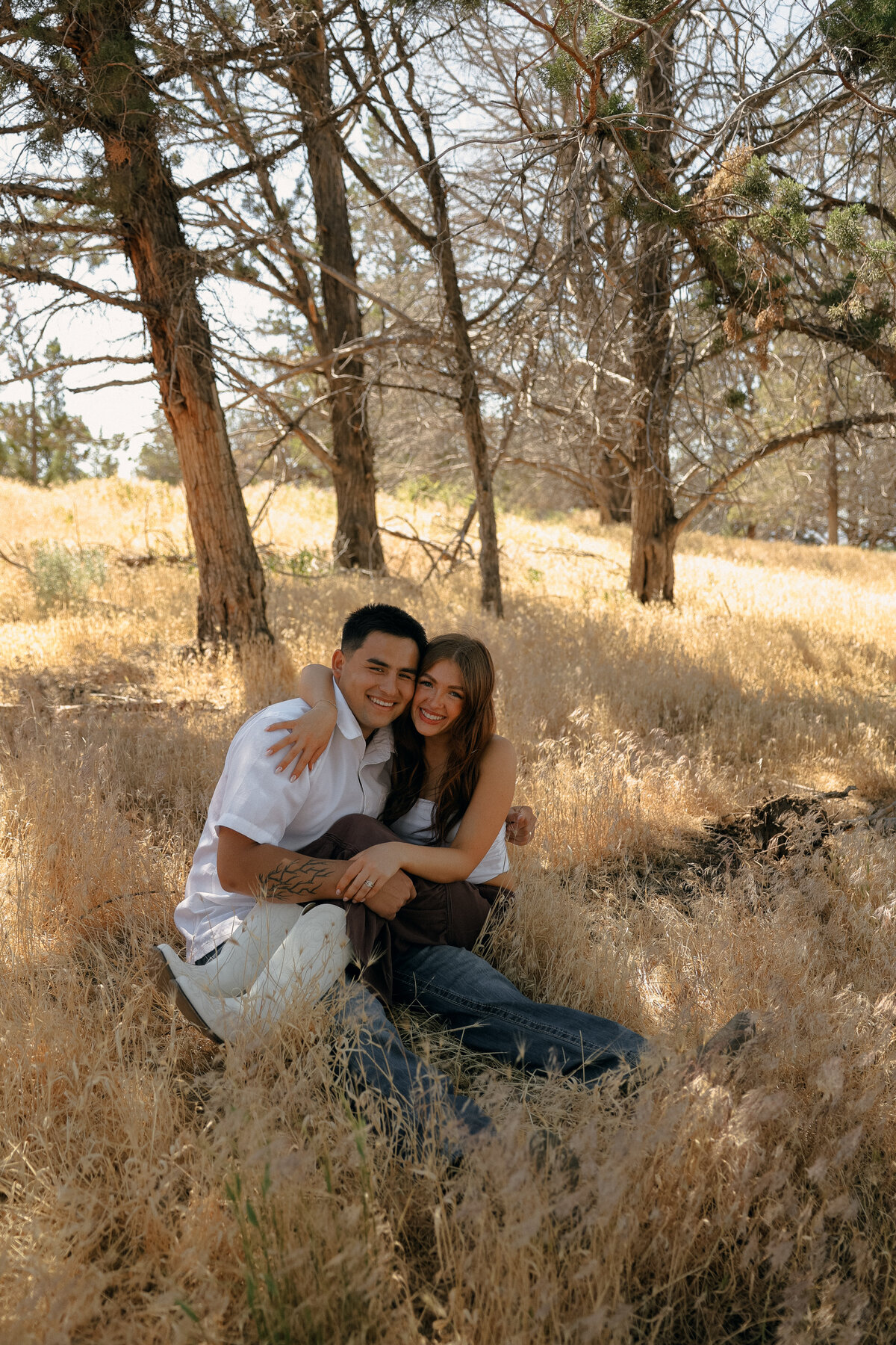 Romantic Oregon Engagement Session with Couple Laughing in Open Field