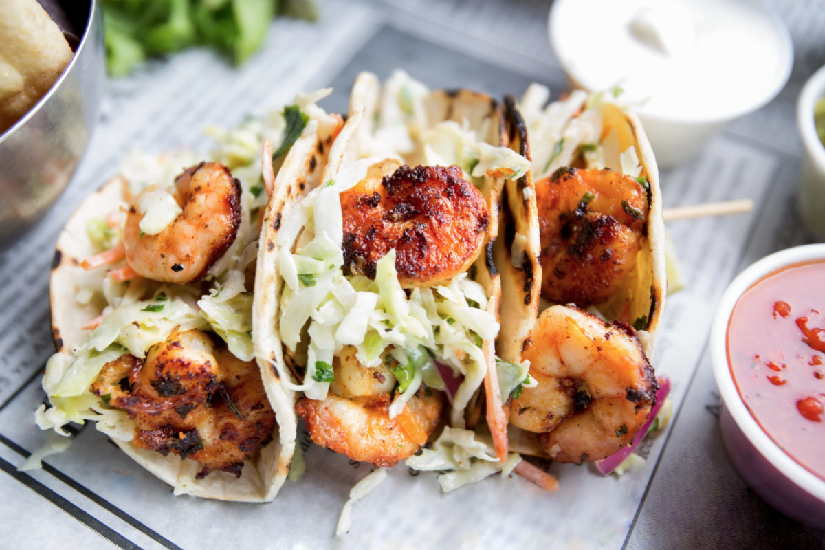3 shrimp tacos on plate
