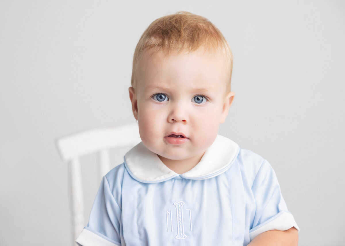1 year old baby boy photographed in studio for his birthday