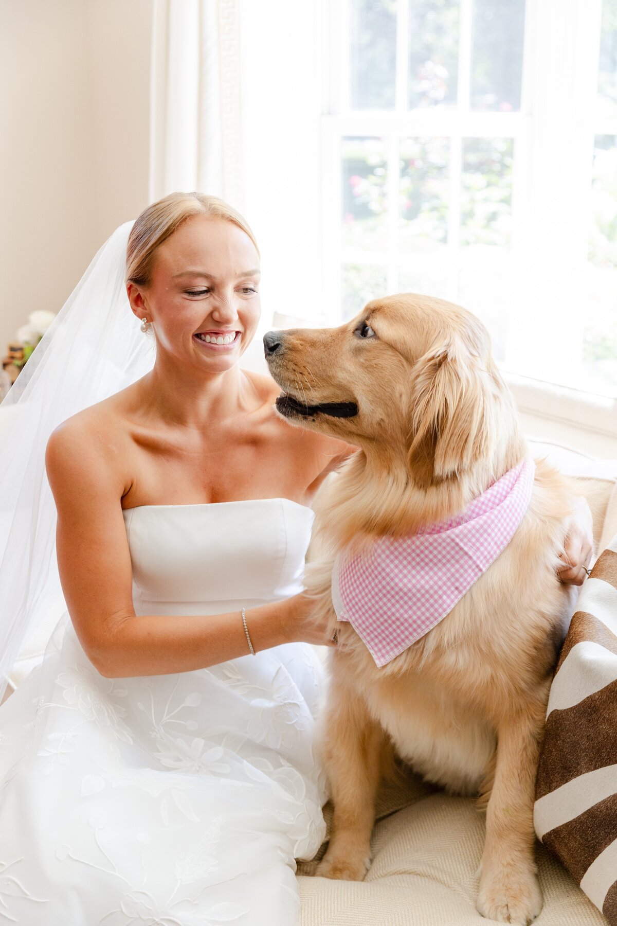 bride and dog during bridal portraits