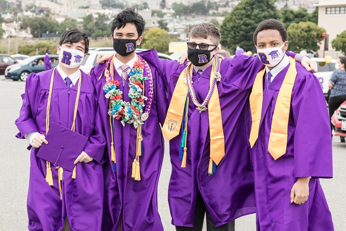grads in purple cap and gown