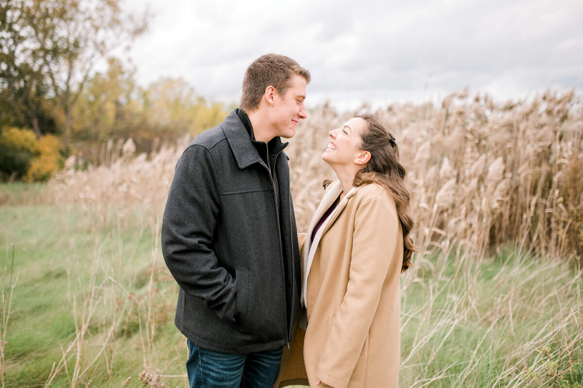 Couple in a field for their Toronto engagement session