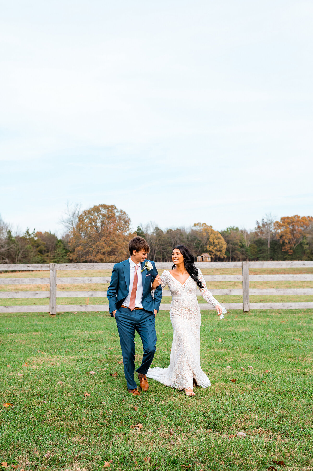 Couple walking during elopement in the fall in Murfreesboro TN