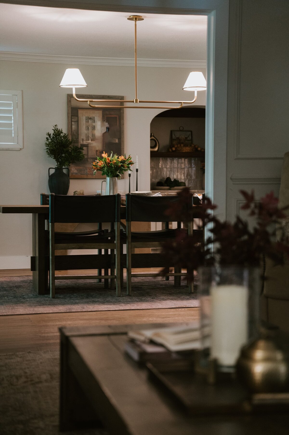 dewine design interiors vintage cove trail dining room with wooden floors and overhead lighting