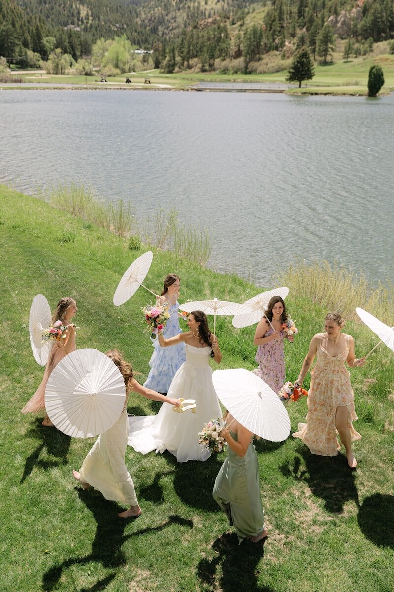 bridesmaids-parasols-aerial-shot