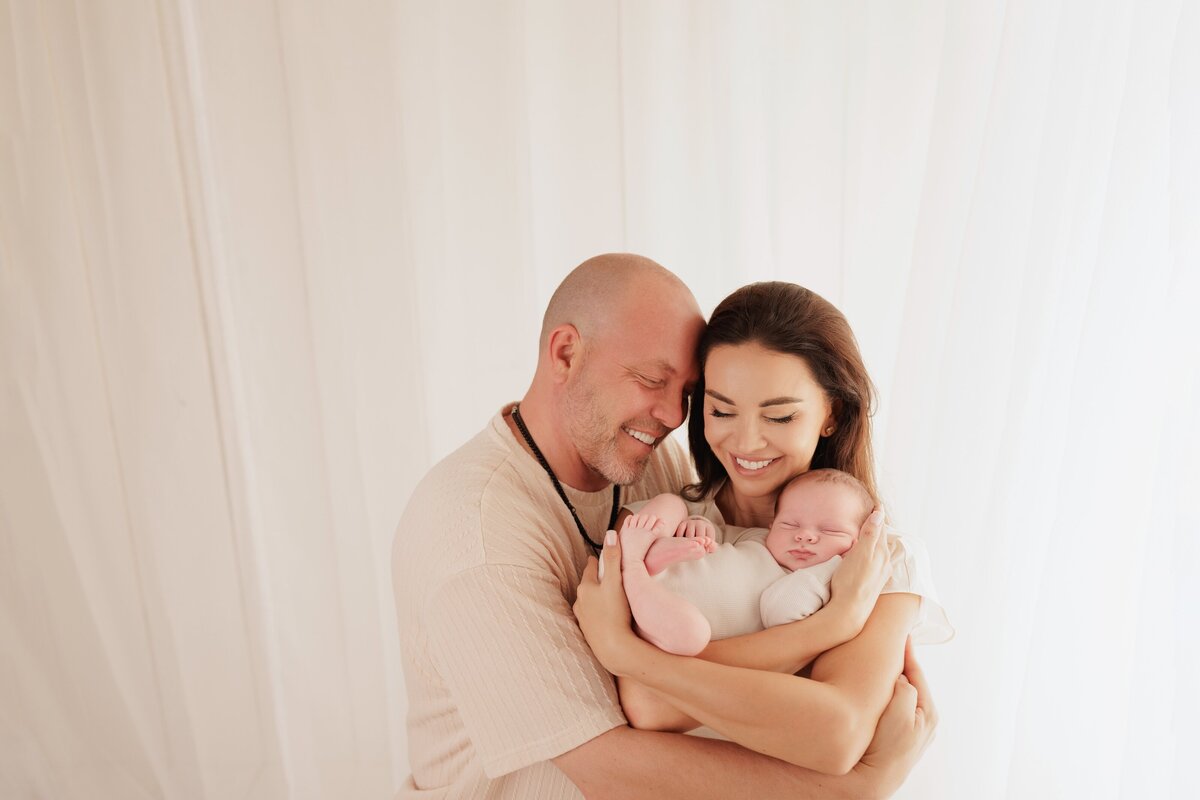 celebrating surrogacy newborn photoshoot,Beautiful newborn portraits in Elk Grove and Sacramento, capturing your baby's precious moments with simple elegance. Book your session today