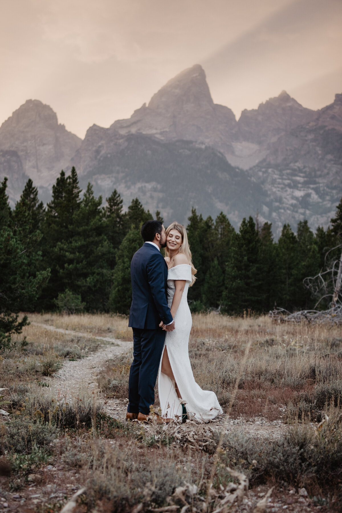 Photographers Jackson Hole capture bride smiling during portraits