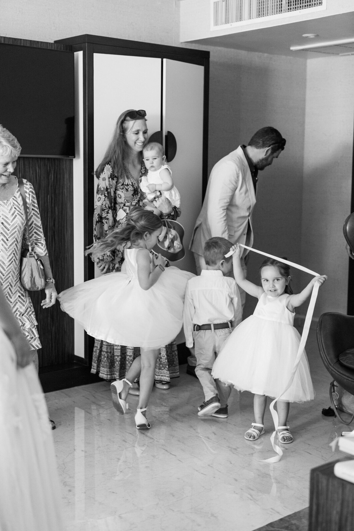 Kids and guests gather excitedly inside before the Cancun wedding, photographed by Philadelphia-based photographer.