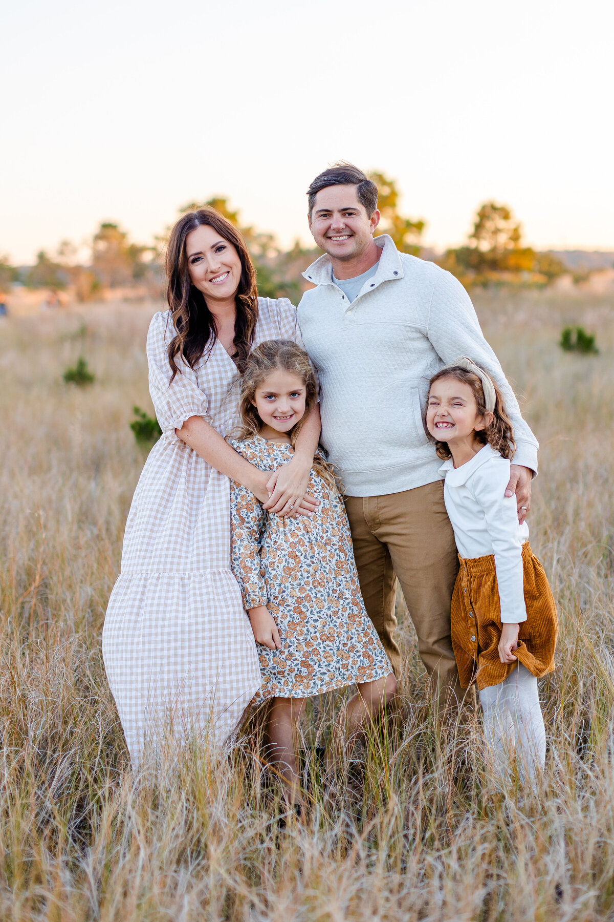 Playful and endearing fall family session with Brooke Tucker at golden hour by the Brock Center in Virginia Beach 