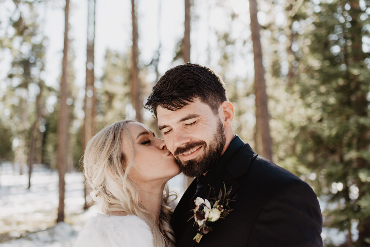 Jackson Hole Photographers capture bride kissing cheek