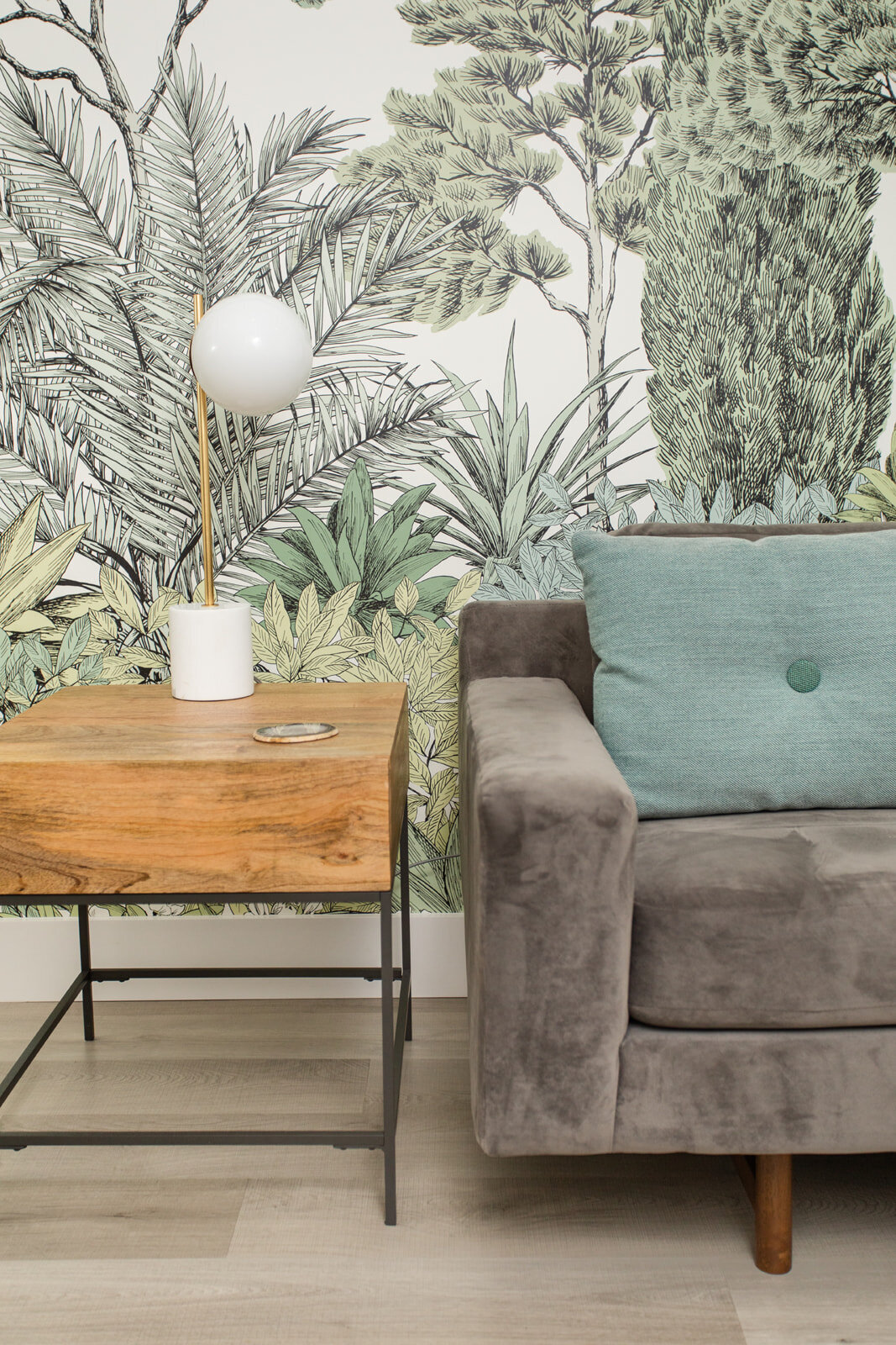 sofa, coffee table and paper wall created by an interior designer