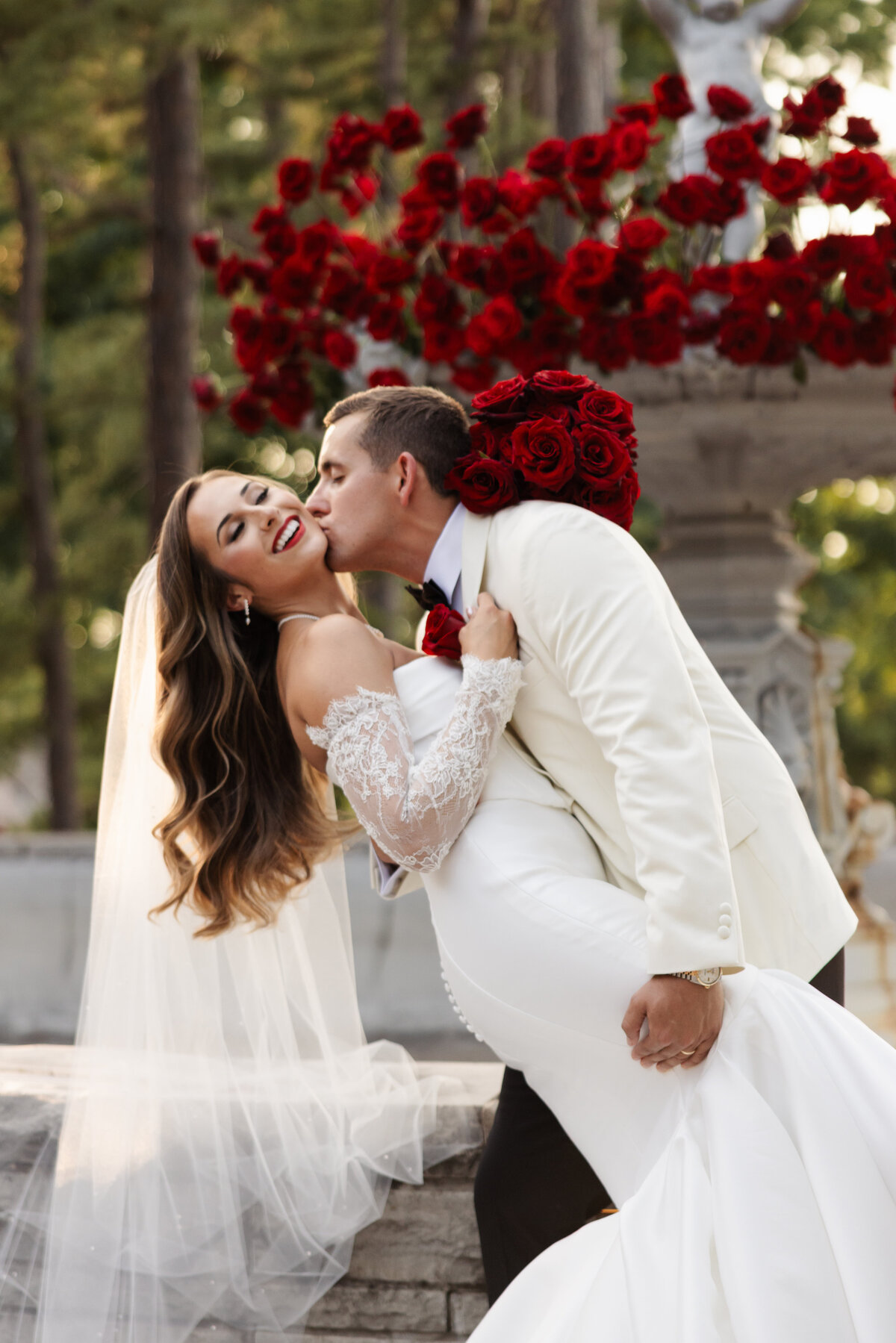 couple wedding kissing cheek.jpg