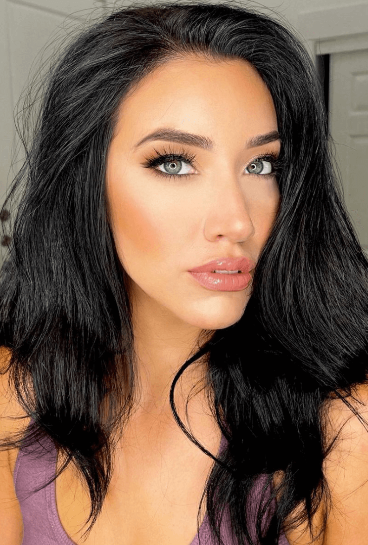 Close-up of woman with flawless glam makeup and voluminous lashes, styled in Dallas by Mistique Makeup for a photo shoot or night out