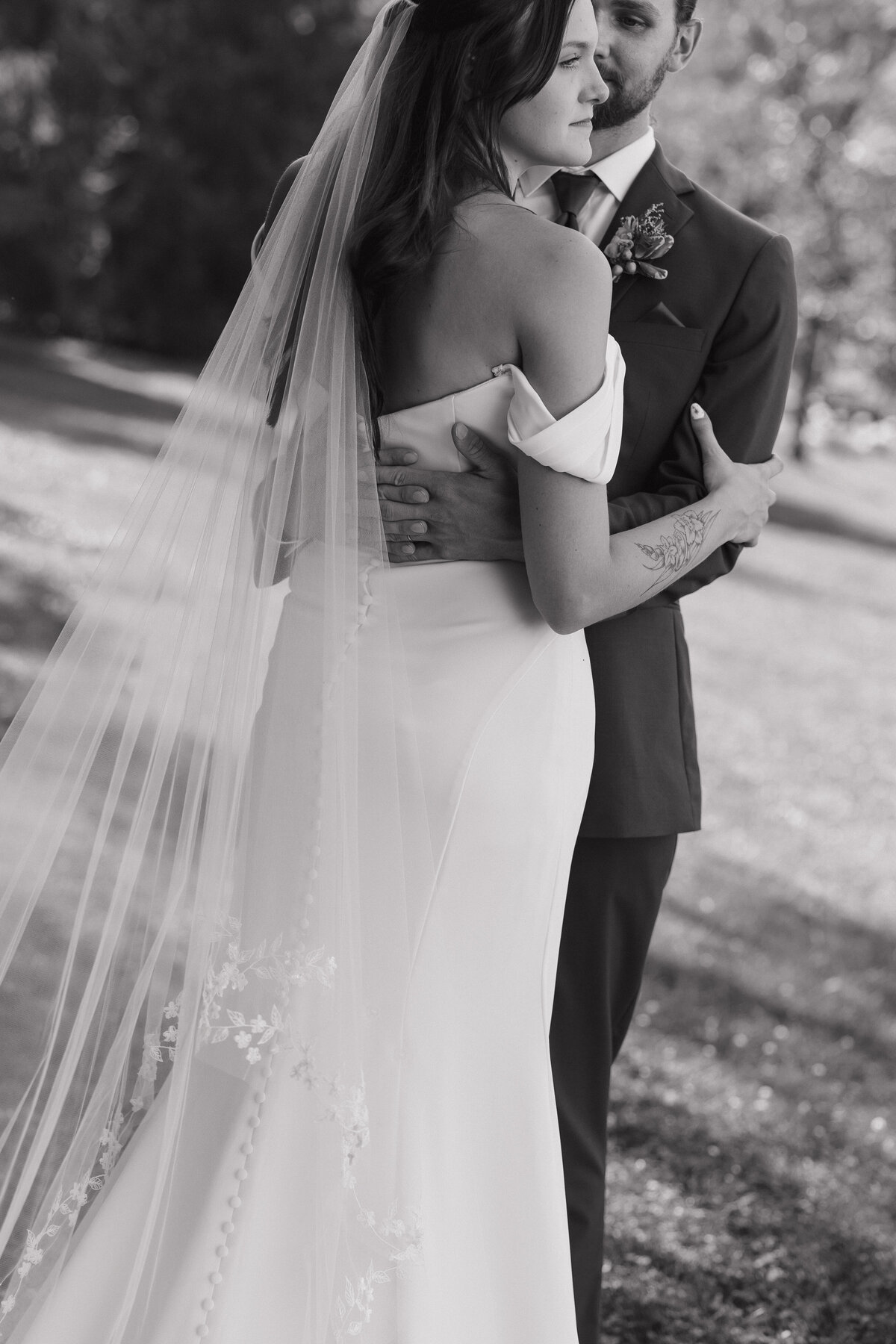 Ryann photographing a couple, bringing authenticity and warmth to wedding photography in Indiana and beyond.