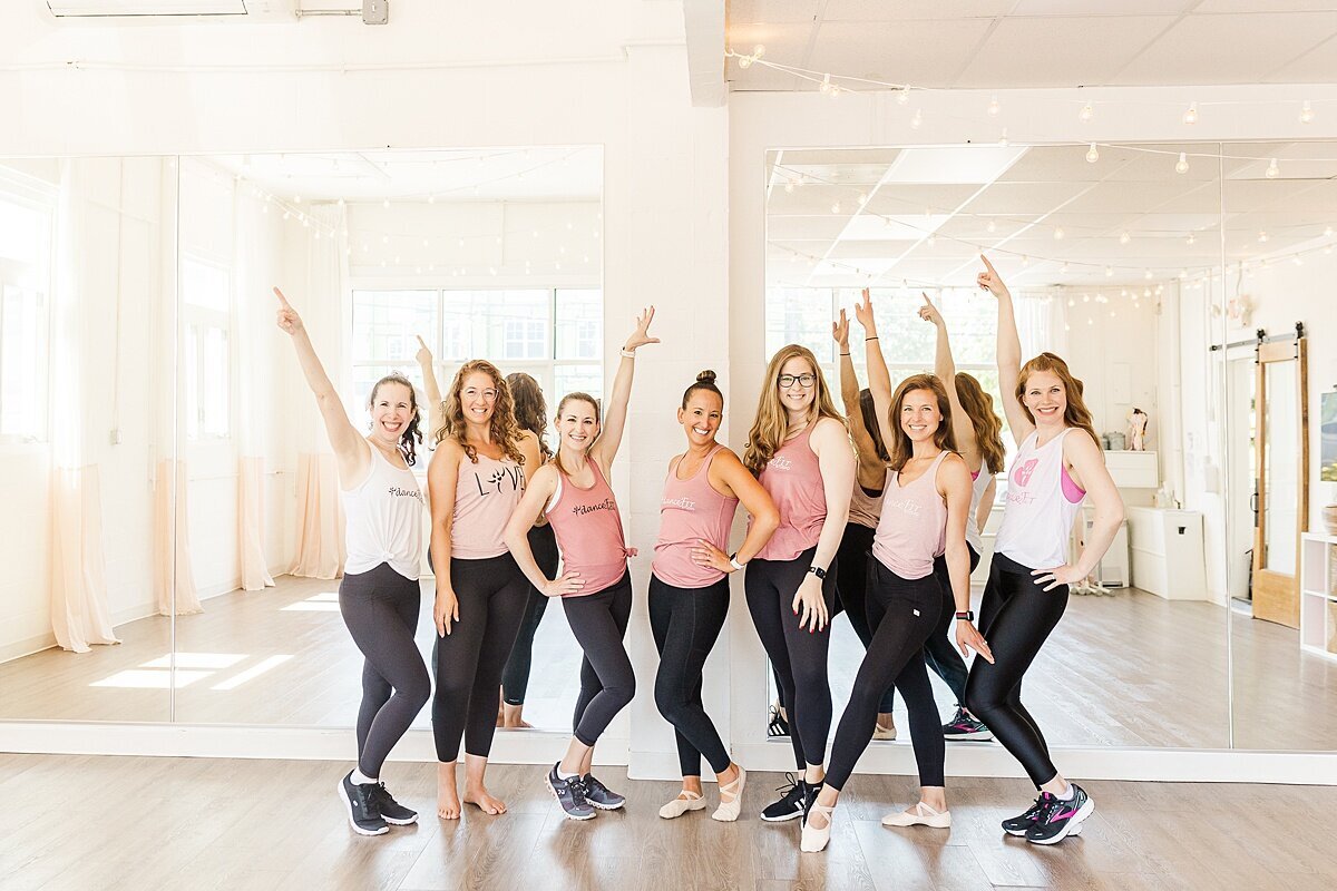 Instructors pose by mirror during DanceFit Branding photo session with Sara Sniderman Photography in Natick Massachusetts
