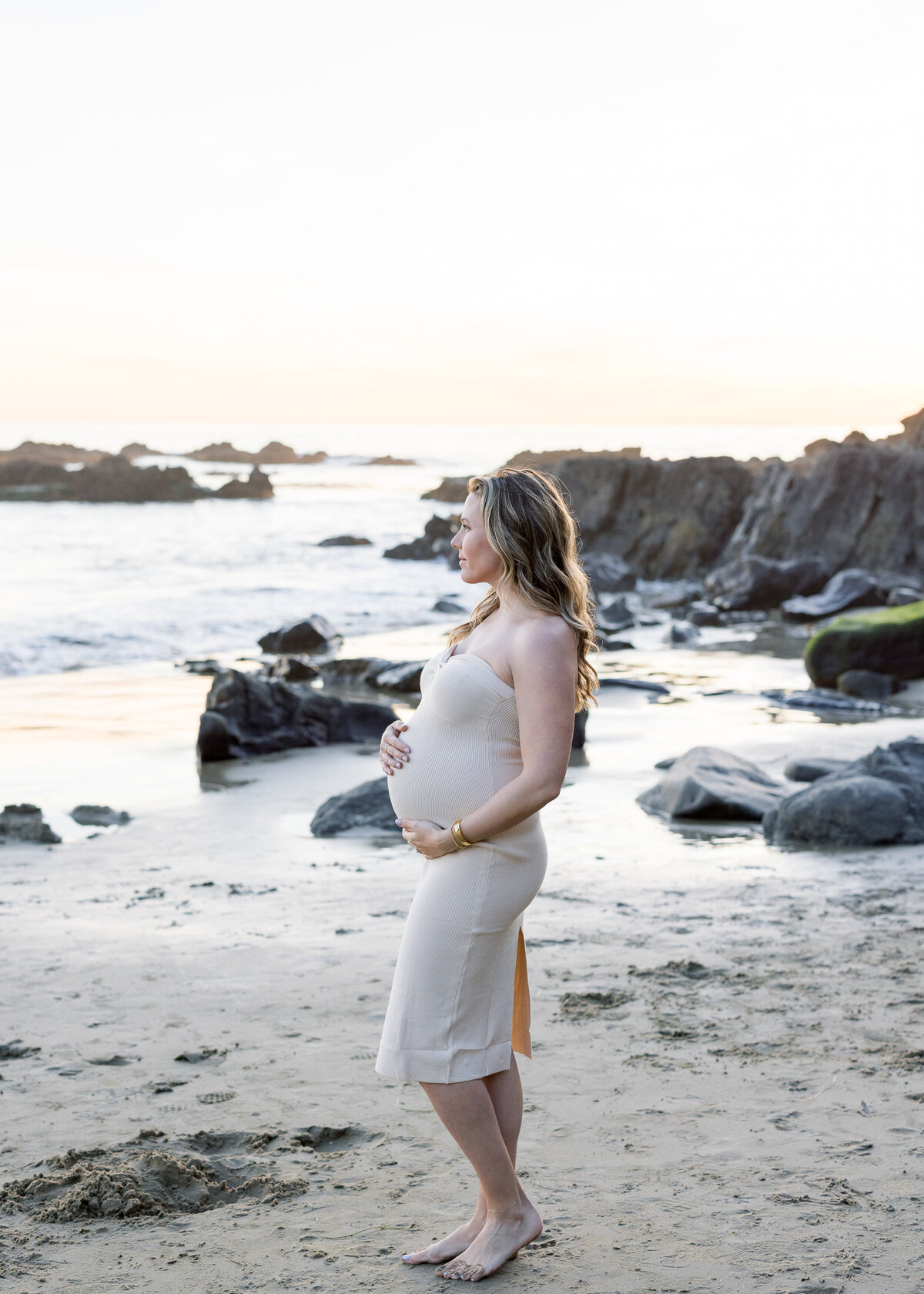 candid beach maternity photo