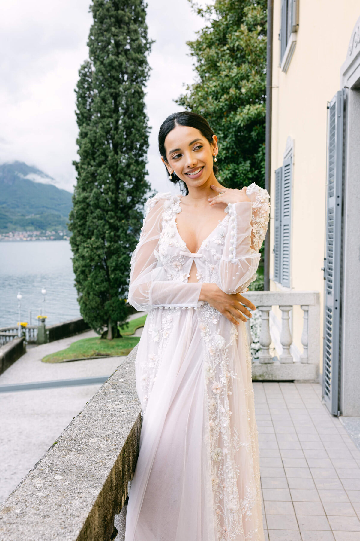 A wedding day bridal shot of a bride in her white dress at Villa Aura del Lago on lake como in Italy