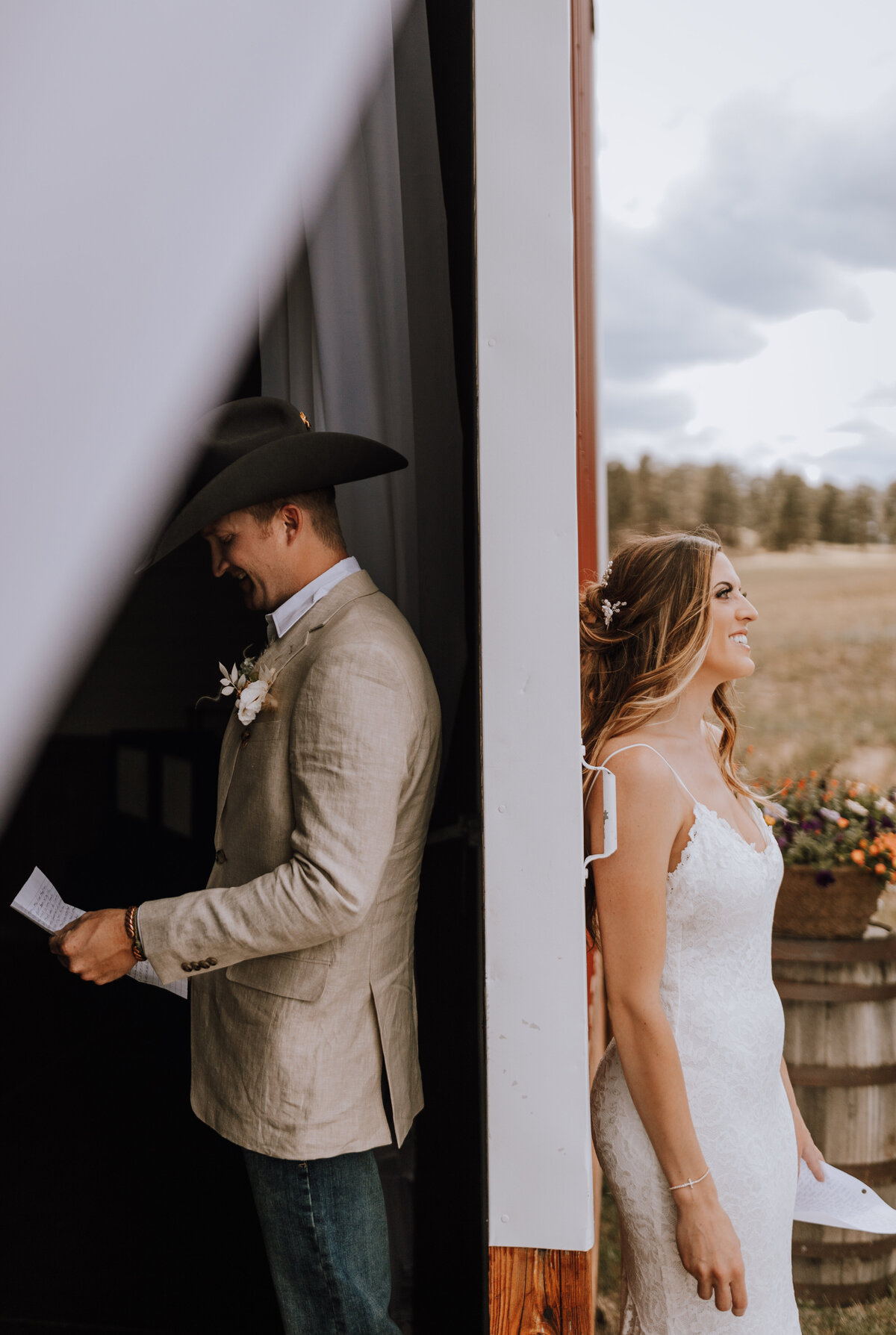 bride and groom reading vows  at younger ranch colorado