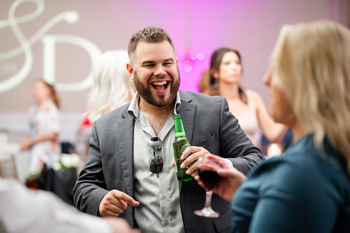 friends dancing at wedding reception