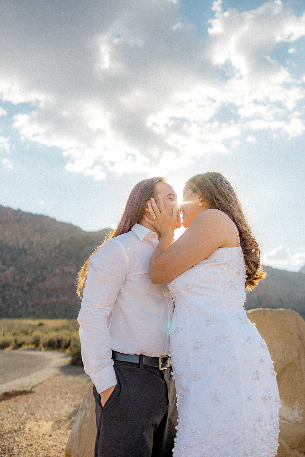 Close up of engaged couple kissing in Nevada