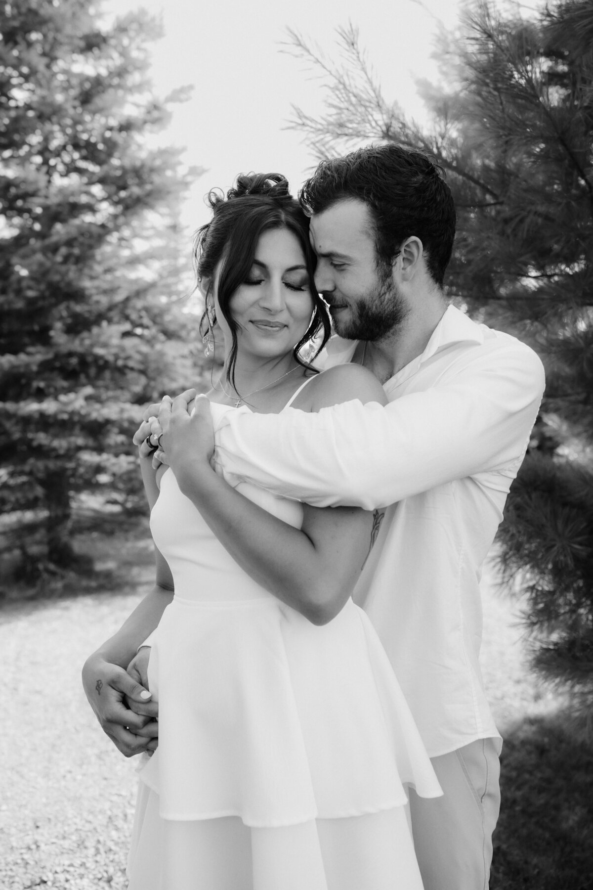black and white portrait of a couple enjoying an embrace
