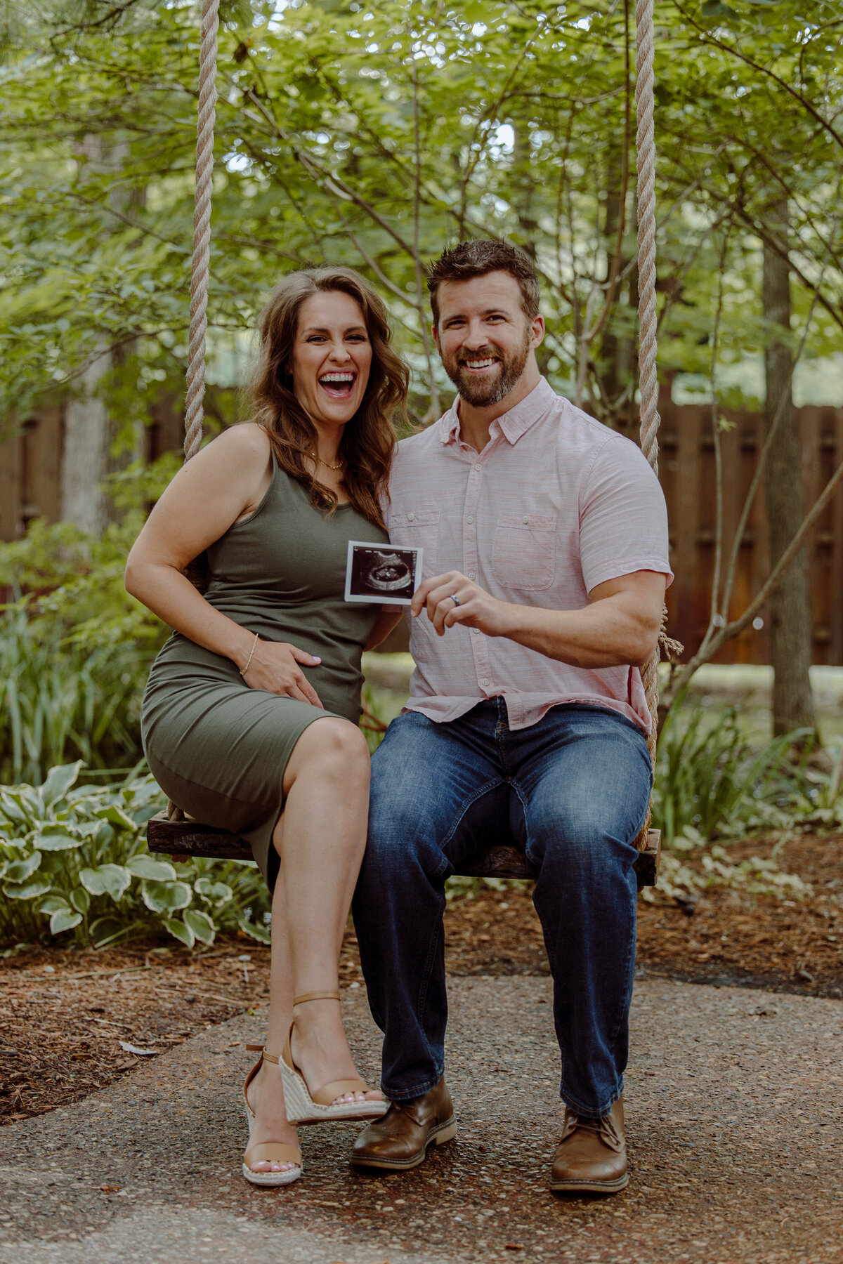 Katie and Owen Anniversary Photos and Baby Reveal at Blue Bridge Traverse City Michigan by Madi Taylor Photo-7
