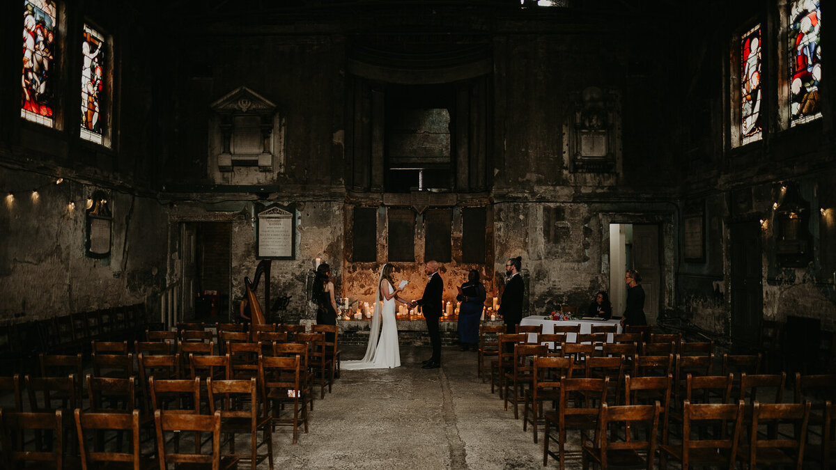 Wide shot of a couple getting married at The Asylum Chapel in London.