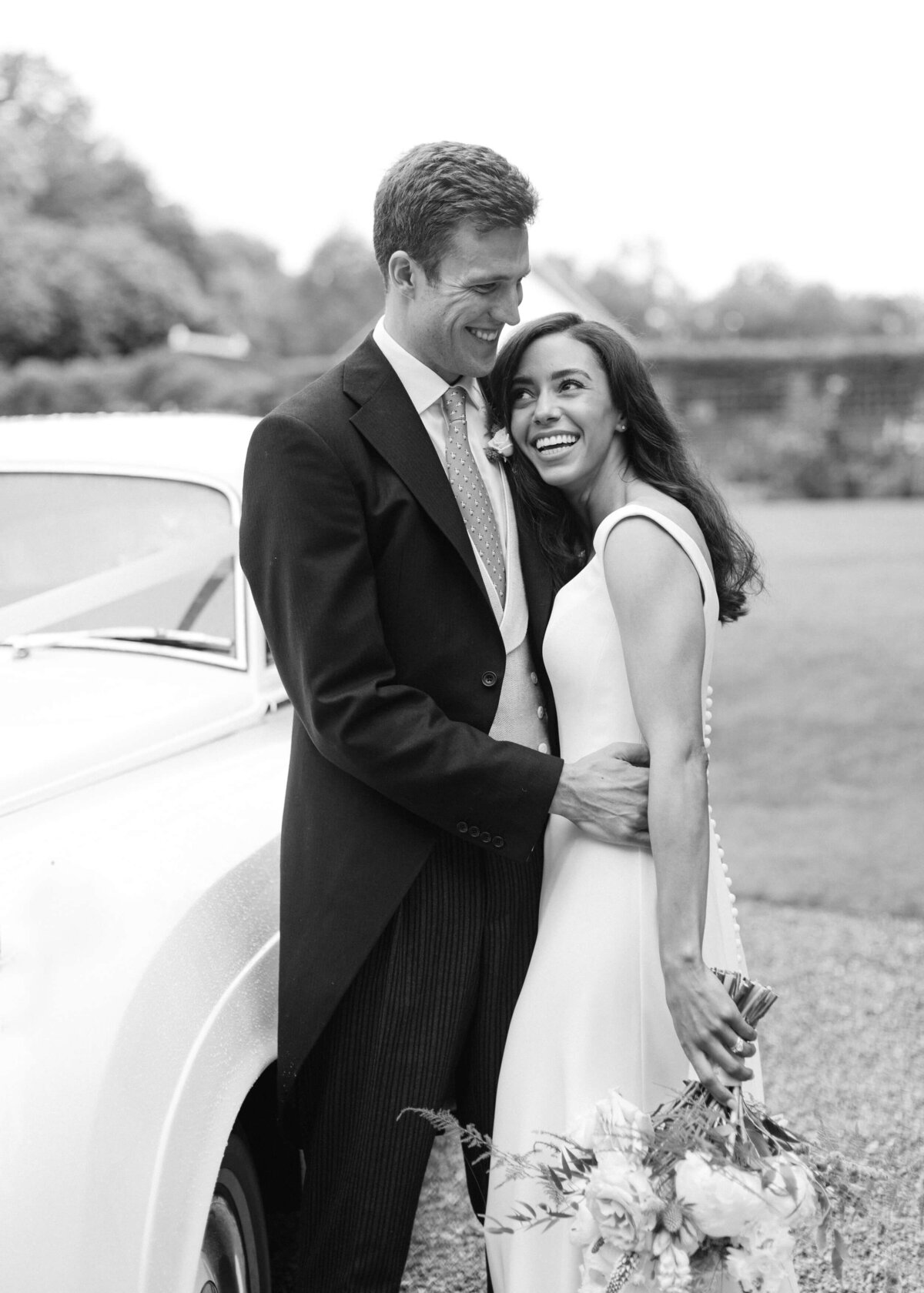 chloe-winstanley-weddings-bride-groom-rolls-royce-black-white