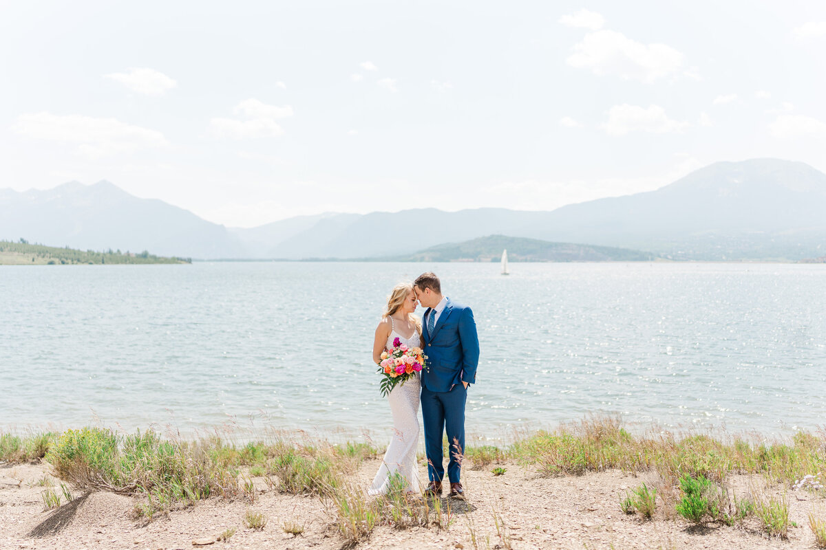 Lake Dillion Reservoir Colorado Elopement Wedding Mountain View Summer Pink and Orange Florals Sparkly Dress Light and Airy Elena Spraguer Photography0089