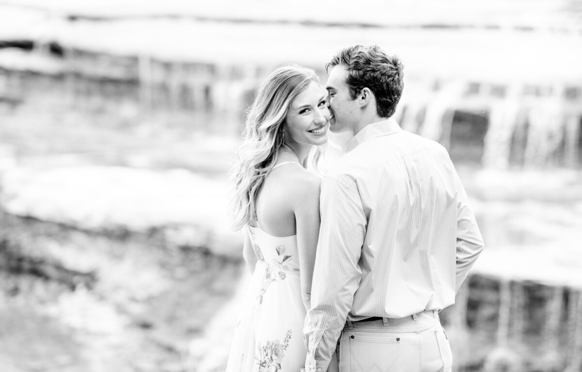 Light and airy black and white engagement picture at airfield falls